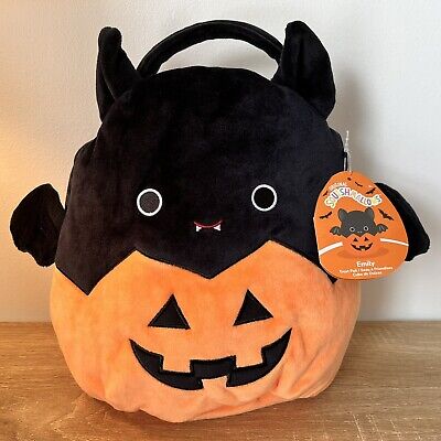 emily in a pumpkin squishmallow