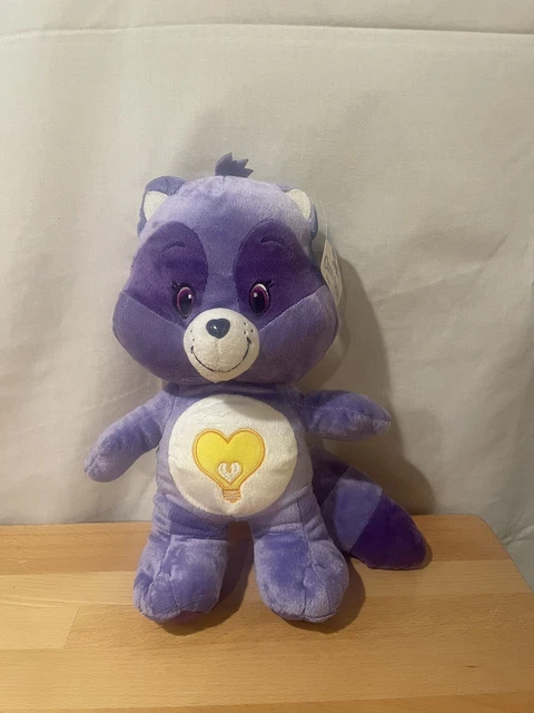 Bright heart raccoon plush top