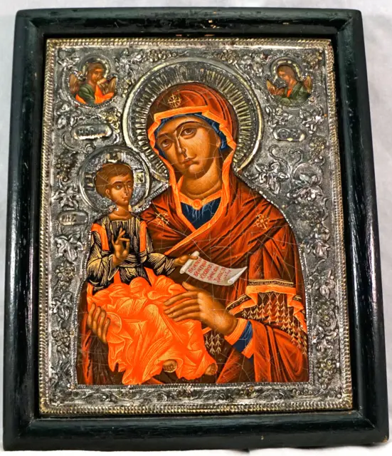 Icono griego trabajado en lienzo revestido de plata con certificado