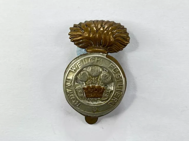 1920-60 Royal Welch Fusiliers Cap Badge Well worn and custom curved 41x26 mm