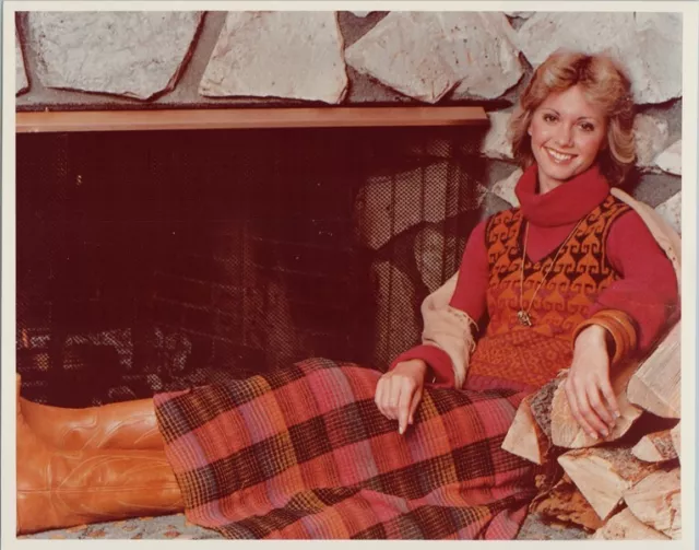 Olivia Newton-John 1970's 8x10 photo at home pose sitting by fireplace