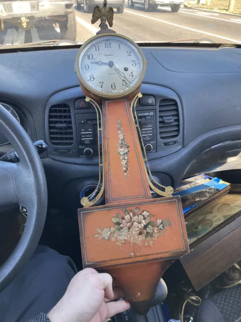 Ingraham 1935 Banjo 8 day wall clock, red finish with flowers 27” Tall