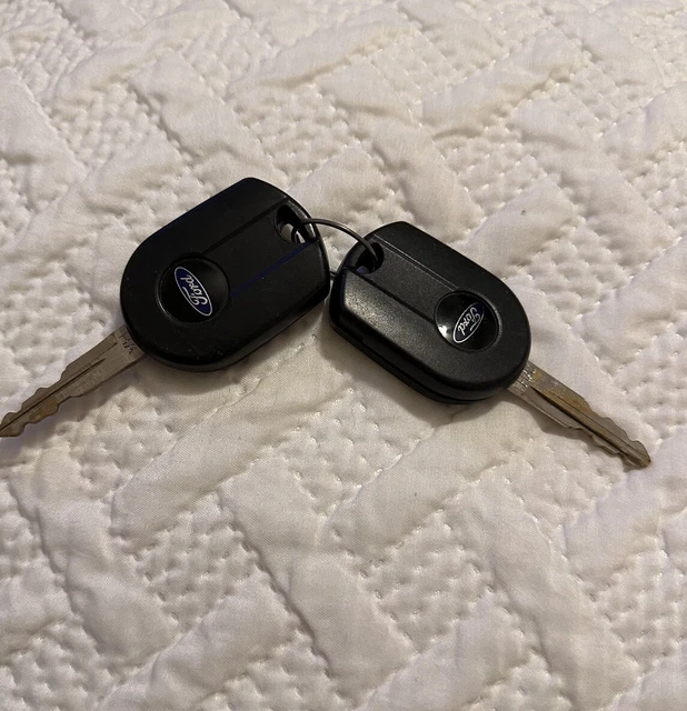 2 Genuine 2010 Ford Escape Key Remote Fobs (4 Button)