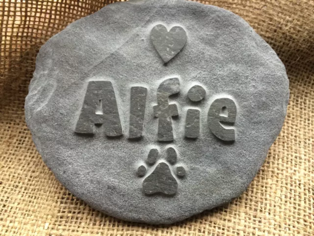 Handcarved bespoke pet memorial in natural stone, dog cat horse, hamster grave