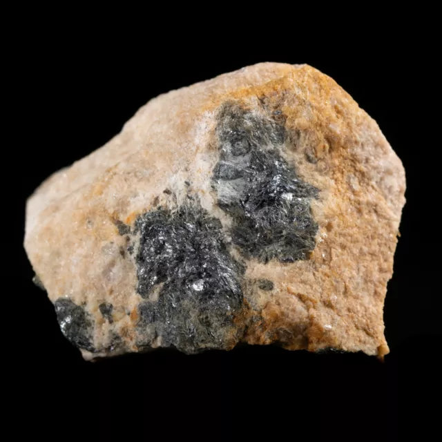 Powellite after Molybdenite on matrix. UV LW Vishnevye Mt., Russia Powellite after Molybdenite on matrix. UV LW Vishnevye Mt., Russia
