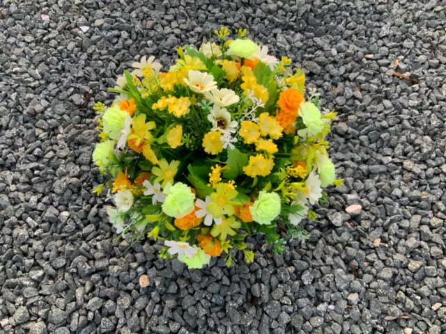 artificial yellow mini carnation arrangement in grave/memorial/crem pot