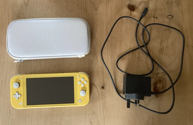 NINTENDO SWITCH LITE Yellow Handheld Console with Charger and Case £52. ...