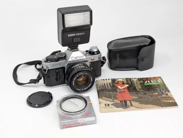 Canon AE-1 Program 35mm SLR Film Camera w/50mm F1.8 Lens, Filter, Manual, Flash