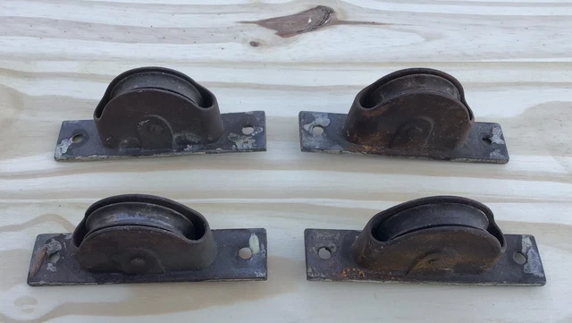VINTAGE VICTORIAN cast iron sash PULLEYS lot of 4
