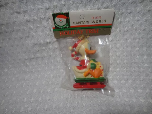 Vintage Santa's World Disney Donald Duck On Sled Kurt Adler Christmas Ornament