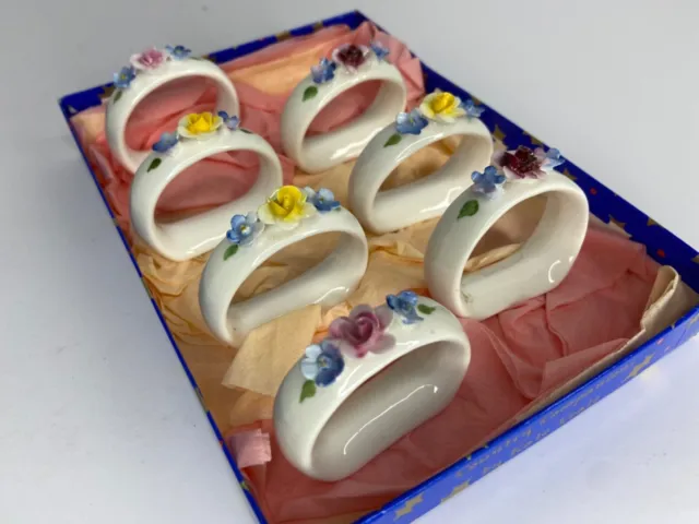 Vintage bone china floral rose white / multicoloured napkin rings set of 7