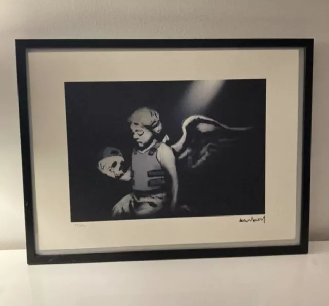 lithographie banksy avec certificat et encadrée