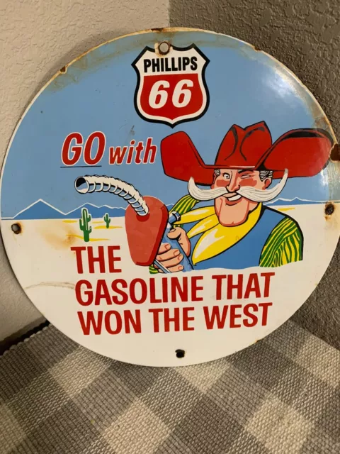 Vintage PHILLIPS 66 GASOLINE "Won the West" Porcelain Sign, Heavy