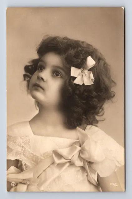 c1910 RPPC European Studio Portrait of Young Girl Curly Hair Real Photo Postcard