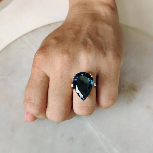 Natural London Blue Topaz and MOISSANITES Cocktail Women Ring in 10k Yellow Gold