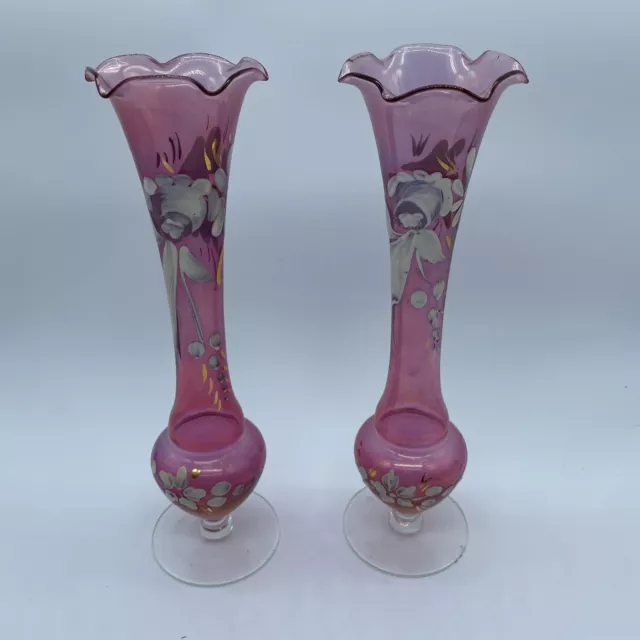 Pair stemmed cranberry glass tall narrow vases with white hand painted floral