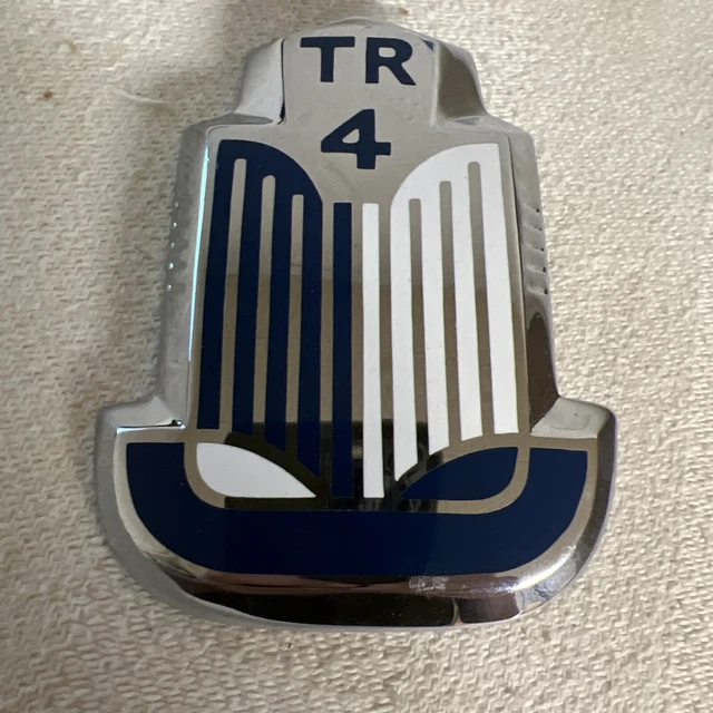 Triumph TR4 Blue & White Enamel and Chrome OPEN BOOK Shield Badge / Medallion Triumph TR4 Blue & White Enamel and Chrome OPEN BOOK Shield Badge / Medallion