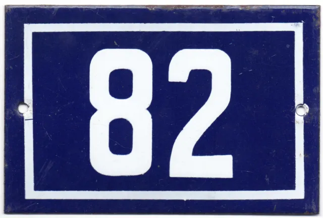 Old blue French house number 82 B door gate wall fence street sign plate plaque