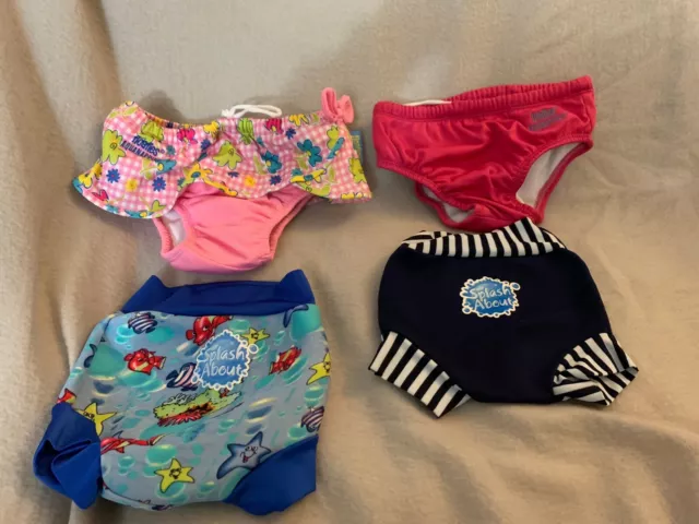 Bundle of 4 swim nappies Splash about and Floaties