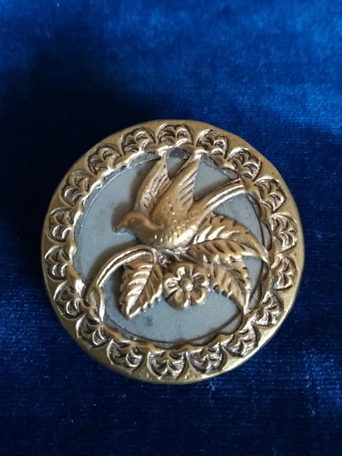 Bouton ancien en métal. 27mm.