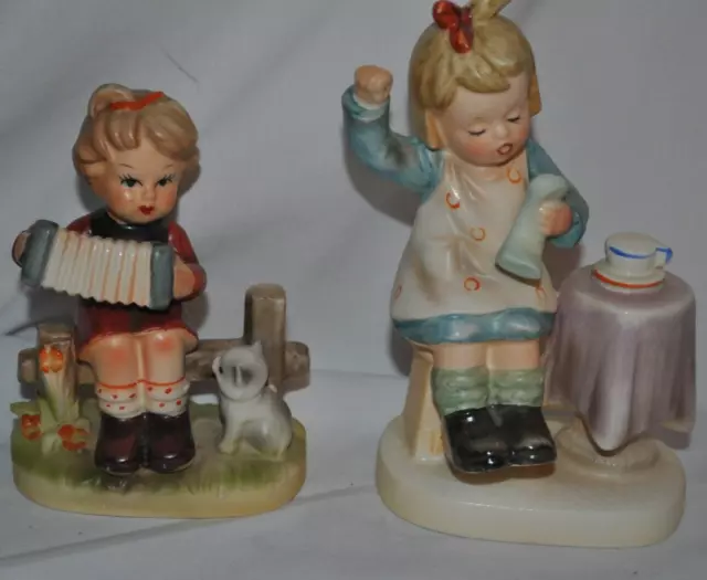 Lot Set 2 NAPCO Little Girl with Accordion & Sewing Mending A sock Figurine