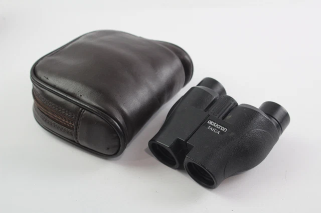 BINOCULARES compactos impermeables Opticron Taiga 8x25 campo 6,0° con estuche en funcionamiento BINOCULARES compactos impermeables Opticron Taiga 8x25 campo 6,0° con estuche en funcionamiento