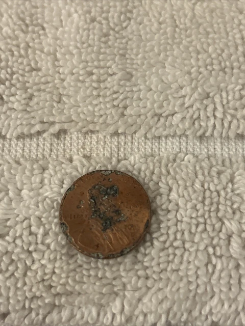 2003 d lincoln Penny Damage On front and back
