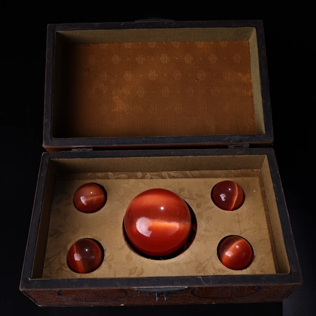 A box of high-quality red cat's eye stones from the Qing Dynasty collection