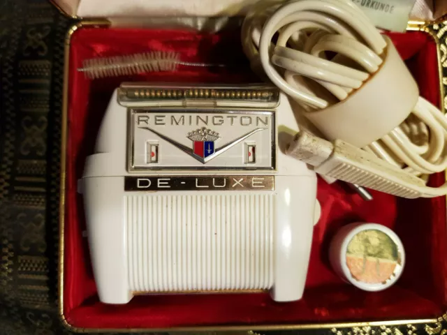 Remington Roll-A-Matic De-Luxe, Vintage Elektrorasierer + Originaletui, 1950er.