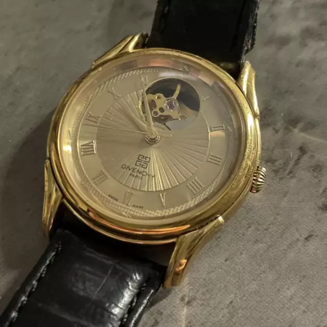 Orologio GIVENCHY Modello Reg Scheletro Automatico Oro 34mm Distribuito da J Benedict