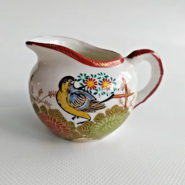Très joli pot à lait porcelaine asiatique, oiseau au milieu des fleurs, dorure
