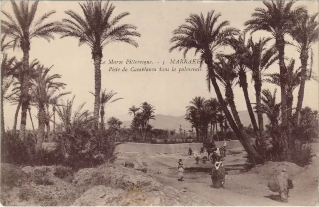 CPA AK MAROC MARRAKECH Piste de CASABLANCA dans la palmeraie (38767)