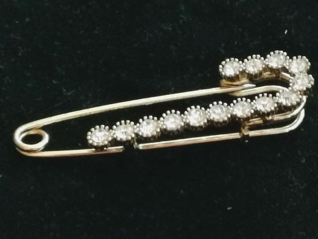 Spilla antica da donna color oro con strass degli anni 70 bigiotteria vintage