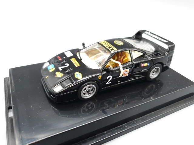 Bburago - Ferrari SF-24#16 Charles Leclerc Imola GP 2024, Scala 1:43, Modellino Diecast con Casco e Teca Espositiva, Dettagli Realistici, Licenza Ufficiale Ferrari, Età 14