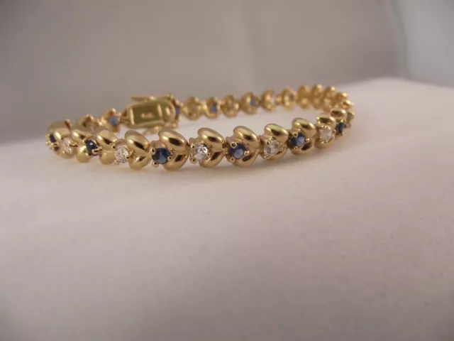 Gold Over Sterling Silver 925 Flower Link Tennis Bracelet w/ Blue, Clear CZ 7.5"