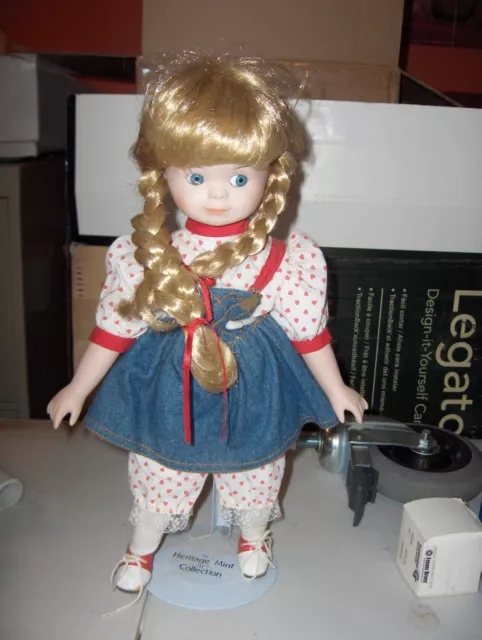 The heritage mint ltd collection 16 inch child porcelain doll . Vintage