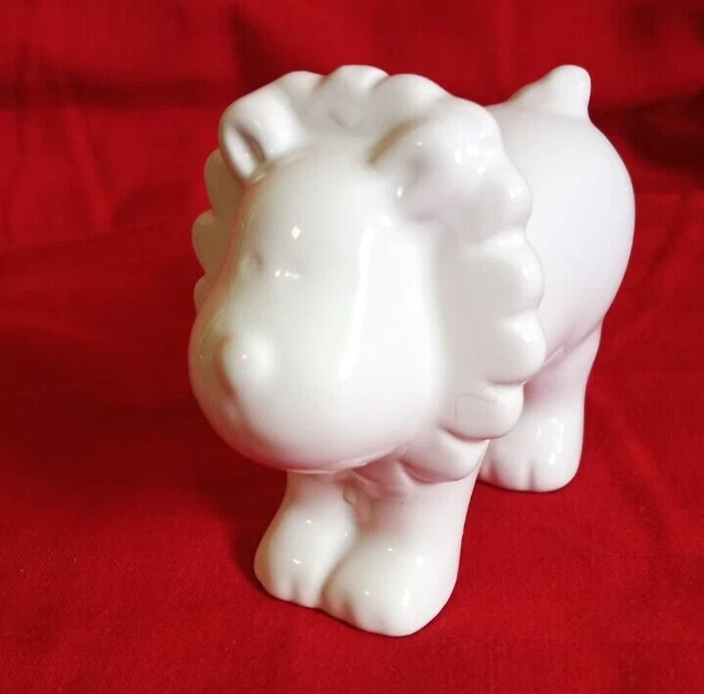 small white ceramic lion , unmarked