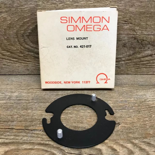 Montaje de lente Simmon Omega CAT. NO. 421-017 en caja original estado es usado
