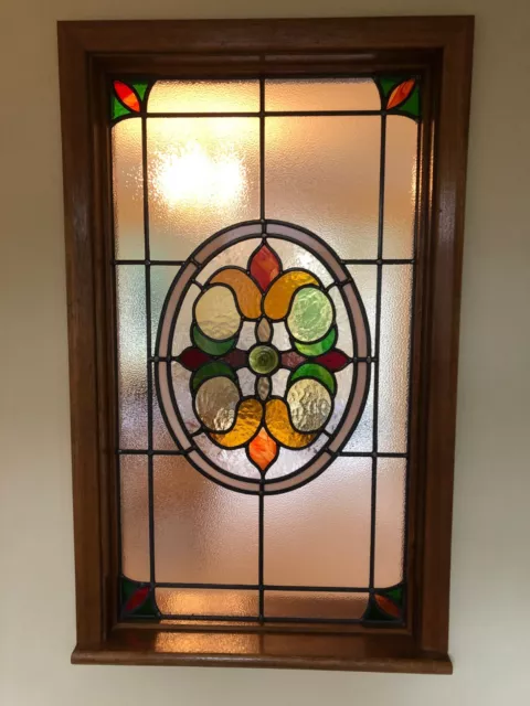 Leaded stained glass window panel complete with wooden frame (if required)