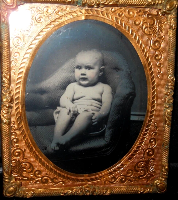 Nice 1/6th size Tintype of young child in brass mat/frame