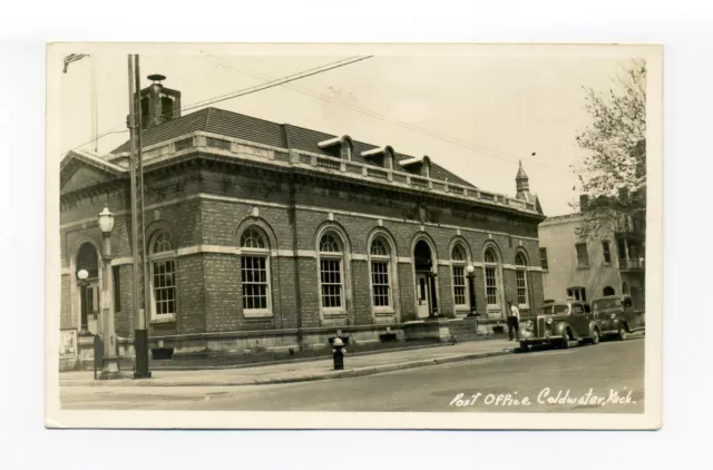 Coldwater MI Branch County RPPC photo postcard man in uniform, cars, post office