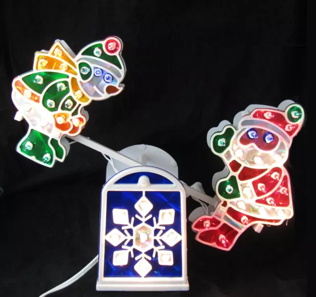 ANIMATED LIGHTED CHRISTMAS Seesaw Decor Avon Holographic Santa
