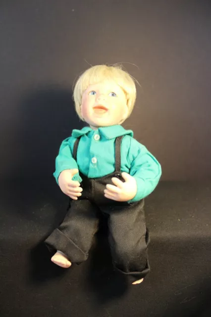 Adorable Boy 9" Sitting Porcelain Doll - Blonde / Blue Eyes  - Green Shirt