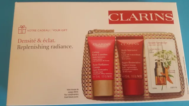 Coffret échantillons Clarins (crèmes jour et nuit, sérum et trousse) neuf 30ml