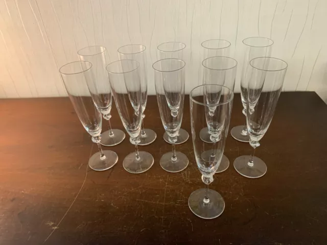 8 flûtes à champagne modèle Boléro en cristal Daum (prix à la pièce)