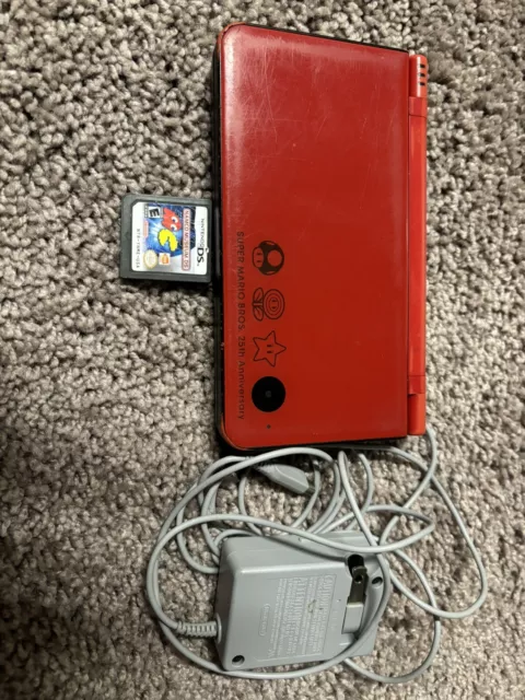 Nintendo DSi XL 25th Anniversary Edition with Mario Bros. Red Handheld (Read)