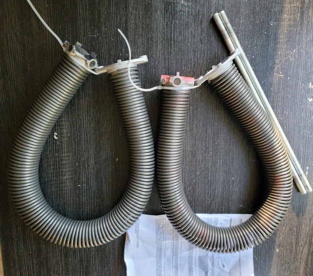 Par de resortes de torsión para puerta de garaje 225 x 1,75 x 30" con barras de bobinado y bujes