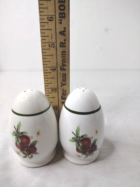 Bees and apples, Eggshaped salt and pepper shakers ,green trim. Bees and apples, Eggshaped salt and pepper shakers ,green trim.