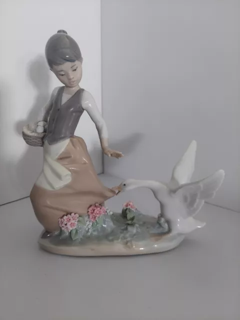 Lladro Aggressive Goose Porcelain Figurine Goose Chasing A Girl With Egg Basket