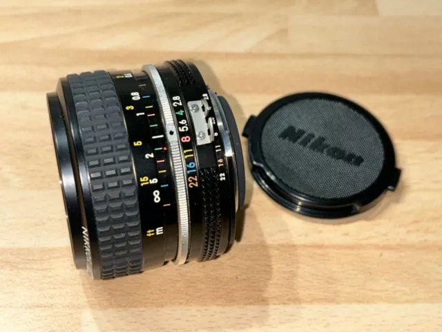 Nikon Nikkor 28mm f2.8 Ai manual focus wide angle lens near mint
